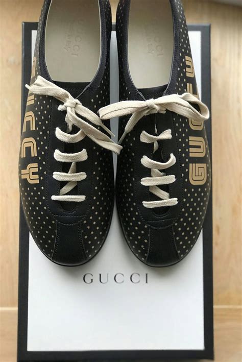 falacer gucci sneakers black gold|Gucci .